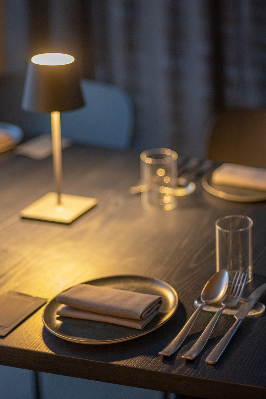 dining table, chair, dining, restaurant, spoon, bowl, light, glass